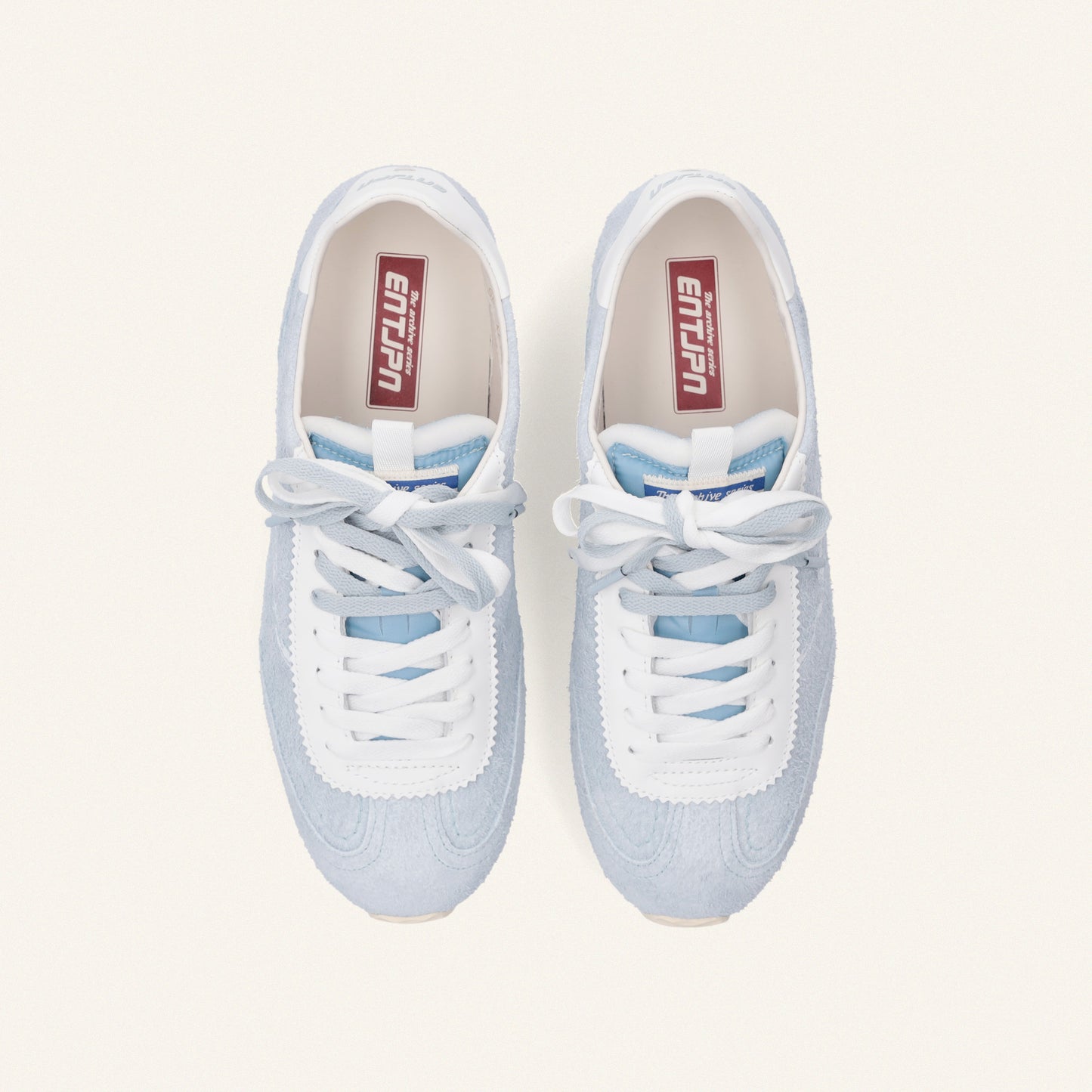 ENTJPN 61 – sky blue suede sneakers