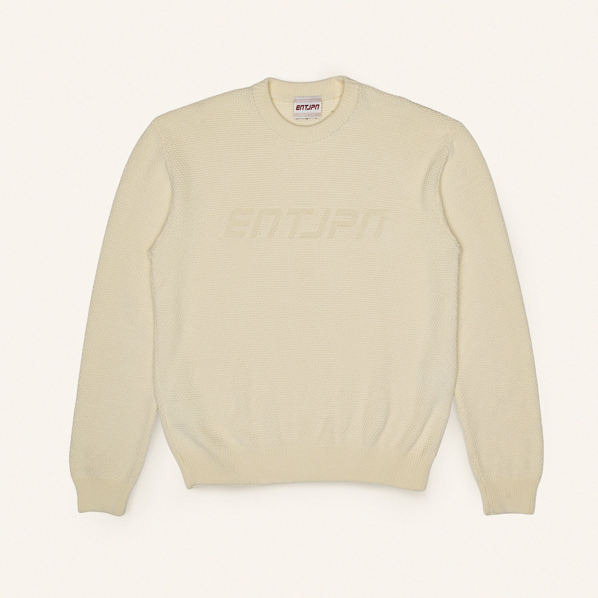 Maglione in cotone color burro con logo ENTJPN