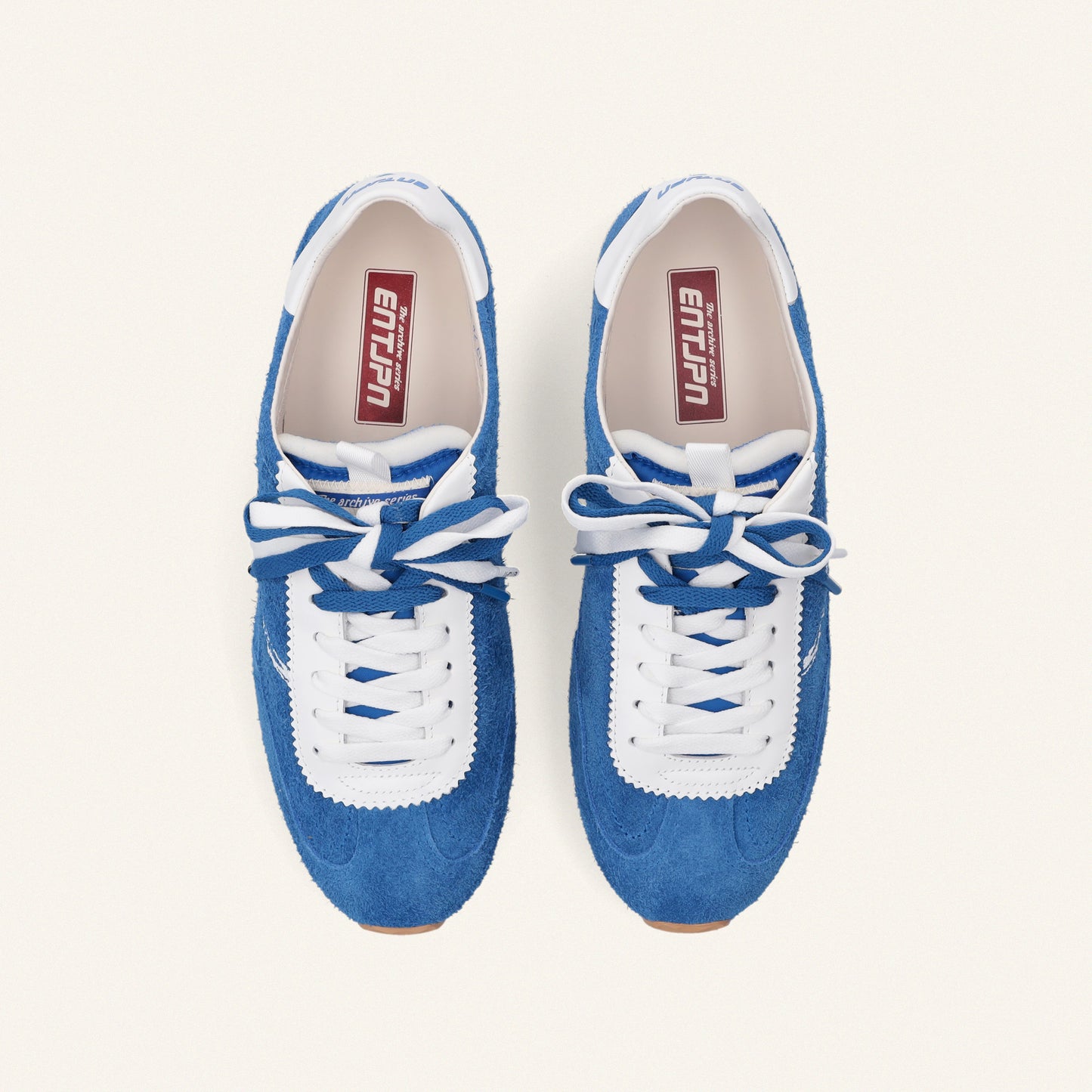ENTJPN 61 – blue suede sneakers