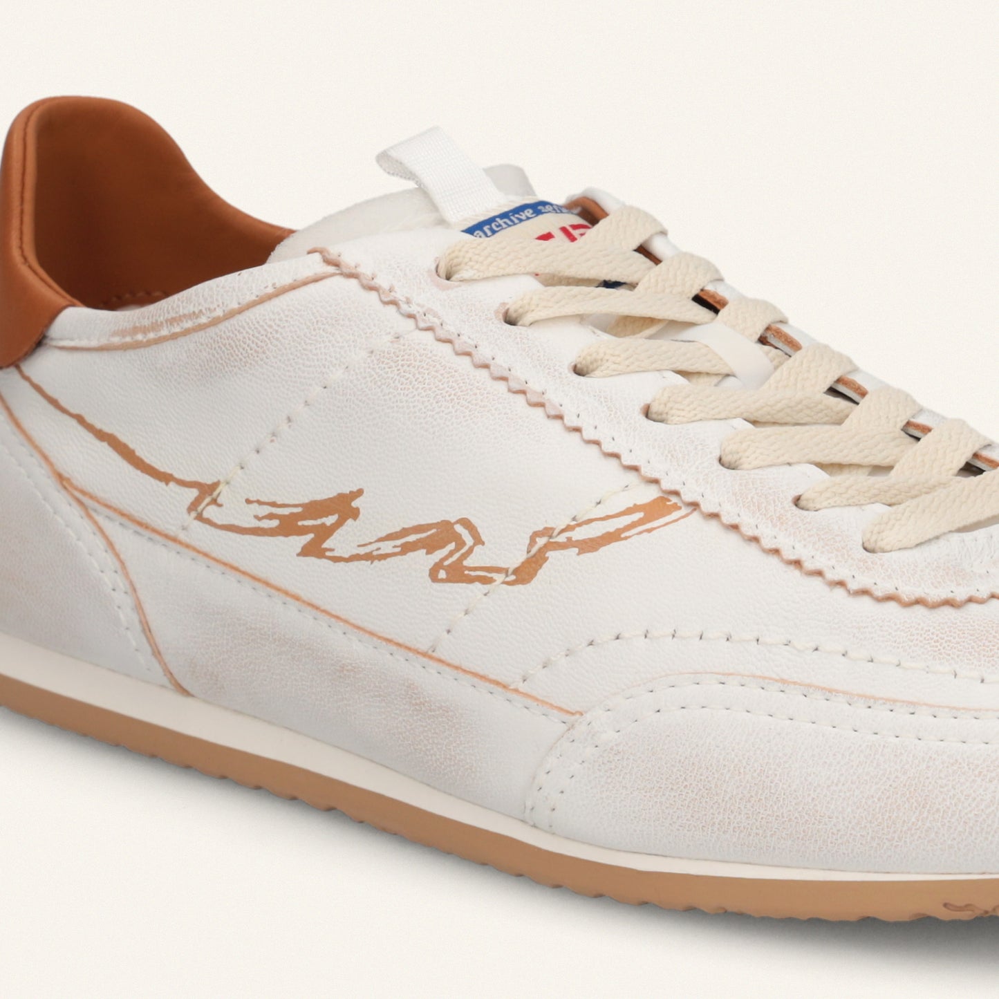 ENTJPN 61 – white leather sneakers with cognac details