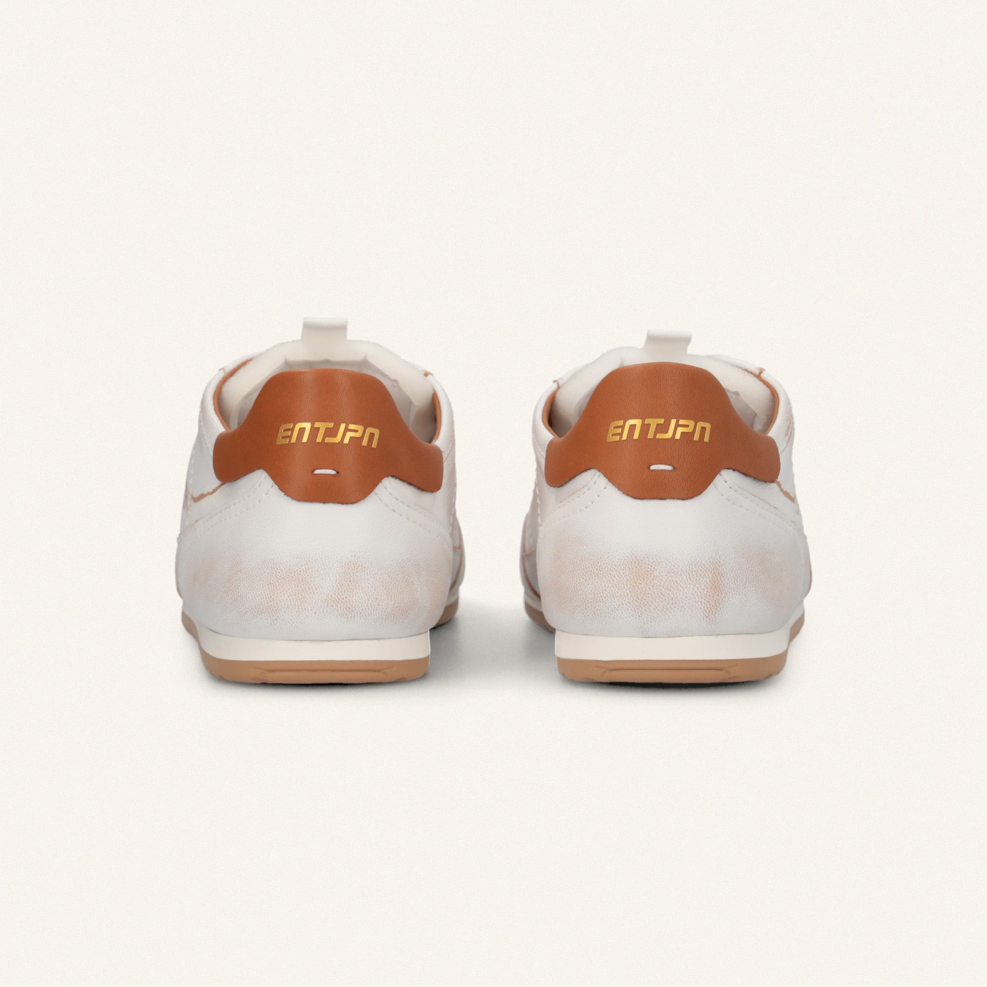 ENTJPN 61 – white leather sneakers with cognac details