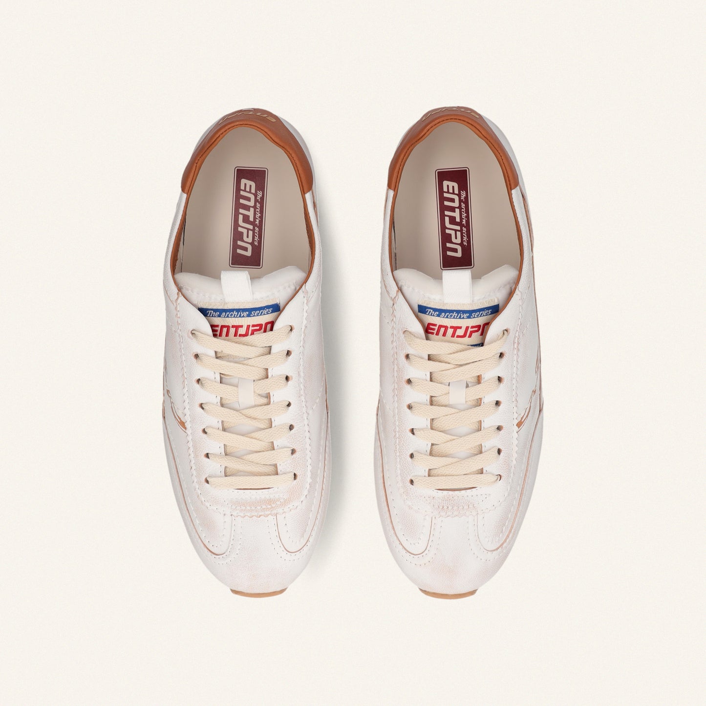 ENTJPN 61 – white leather sneakers with cognac details