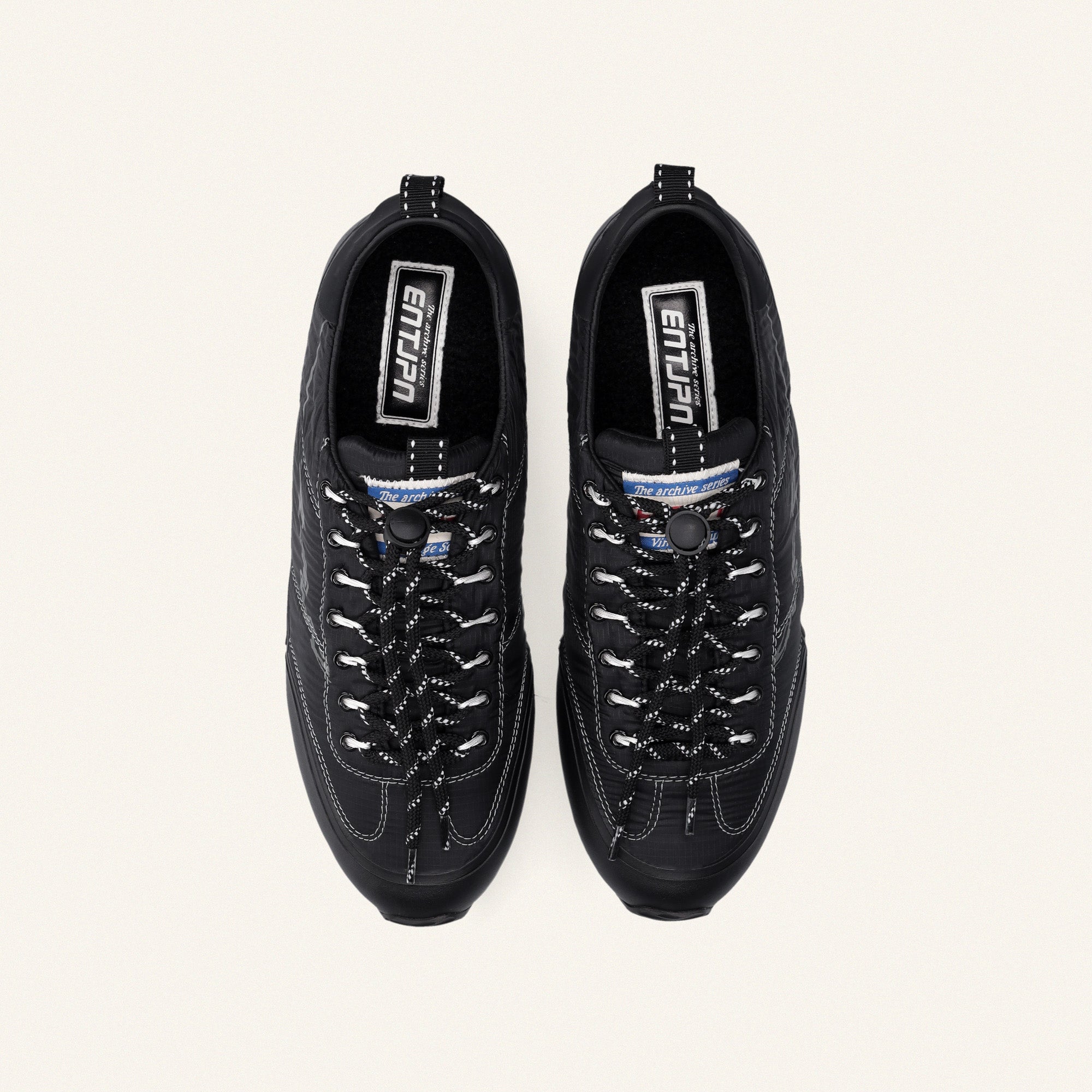 ENTJPN 61 Alpina | The Archive Series black nylon unisex sneakers