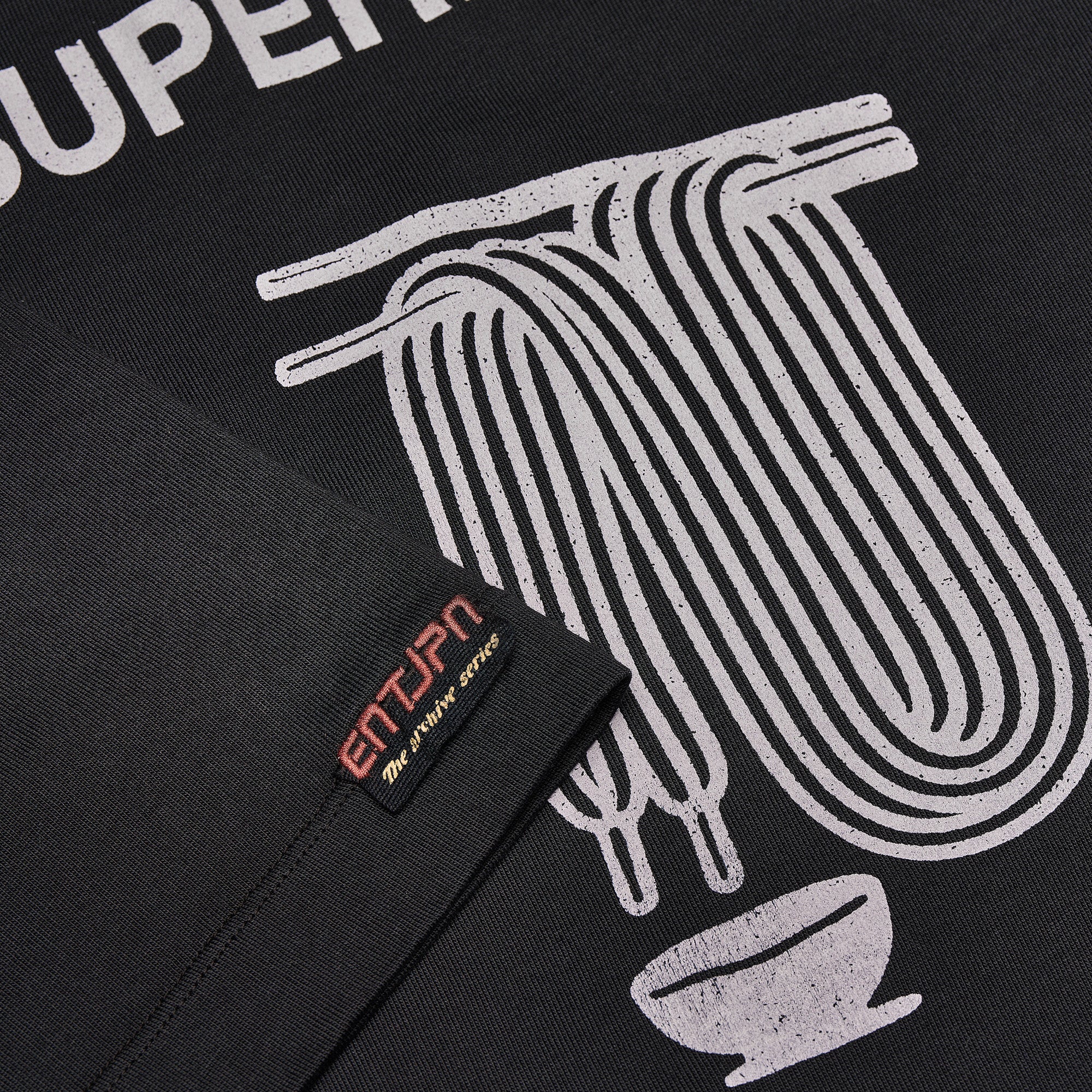 T-shirt in cotone nero con stampa 'Supermarket'