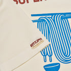 T-shirt in cotone color burro con stampa 'Supermarket'