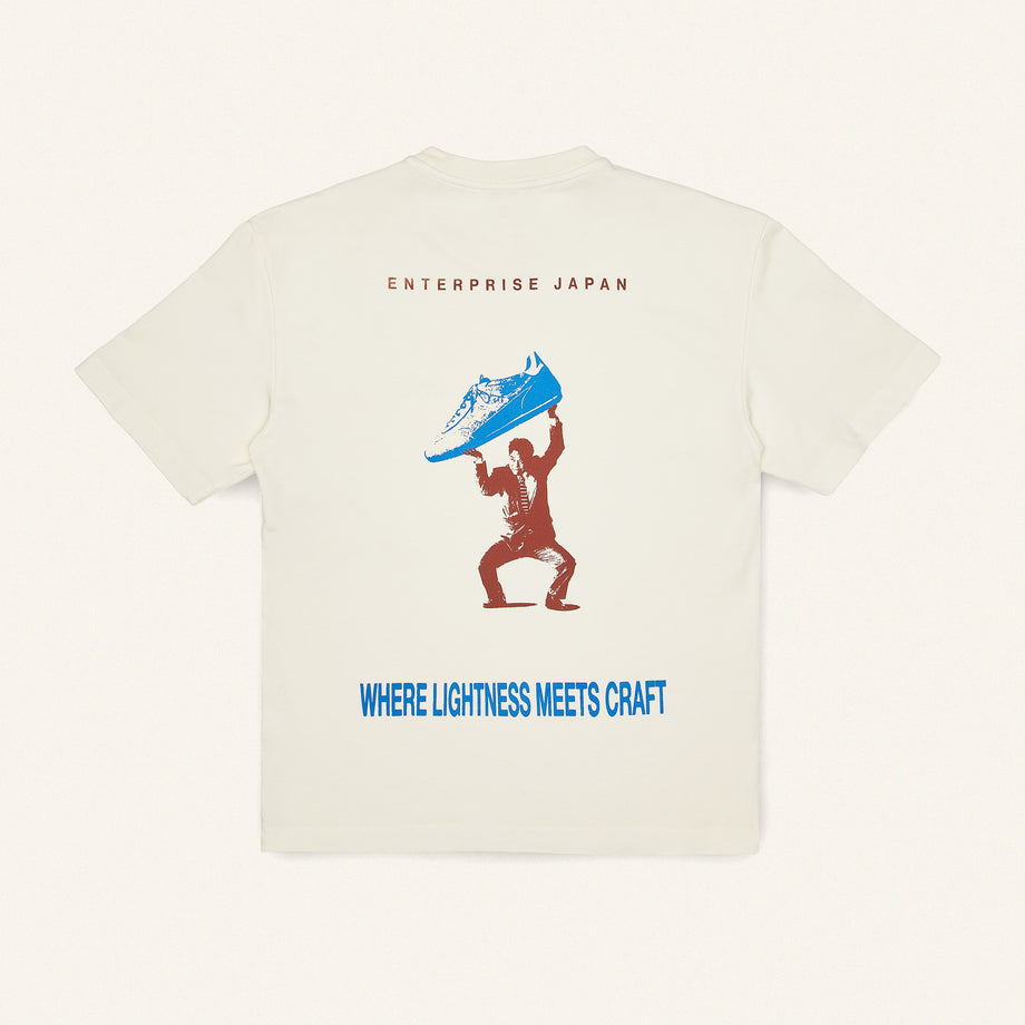 T-shirt in cotone con stampa 'Where Lightness Meets Craft'