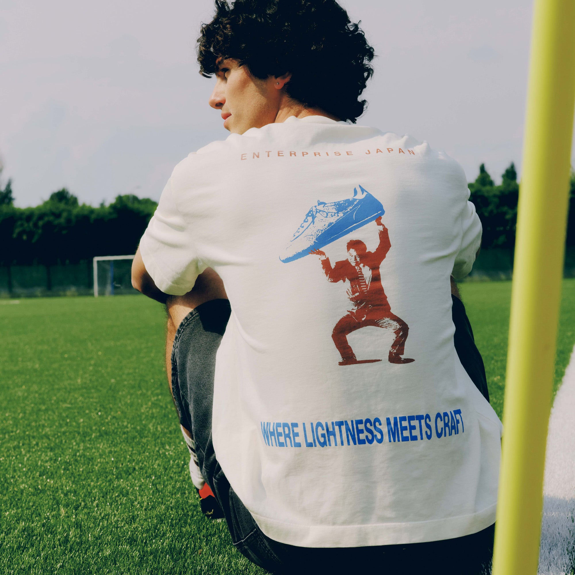 T-shirt in cotone con stampa 'Where Lightness Meets Craft'