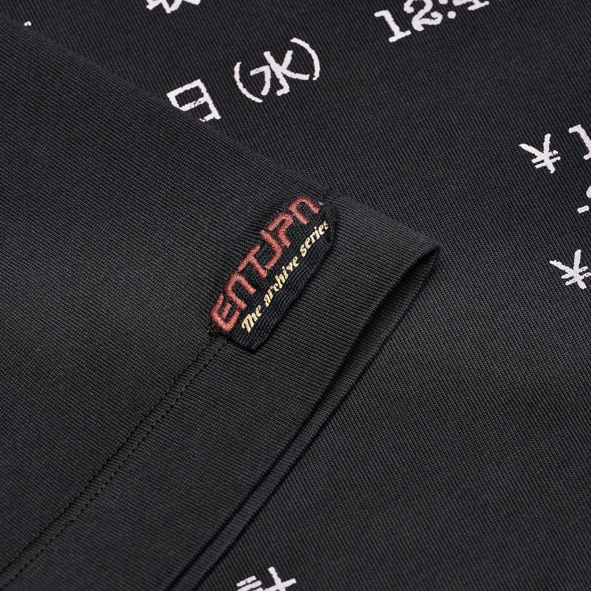 Black cotton T-shirt with “Enterprise Japan Market” print