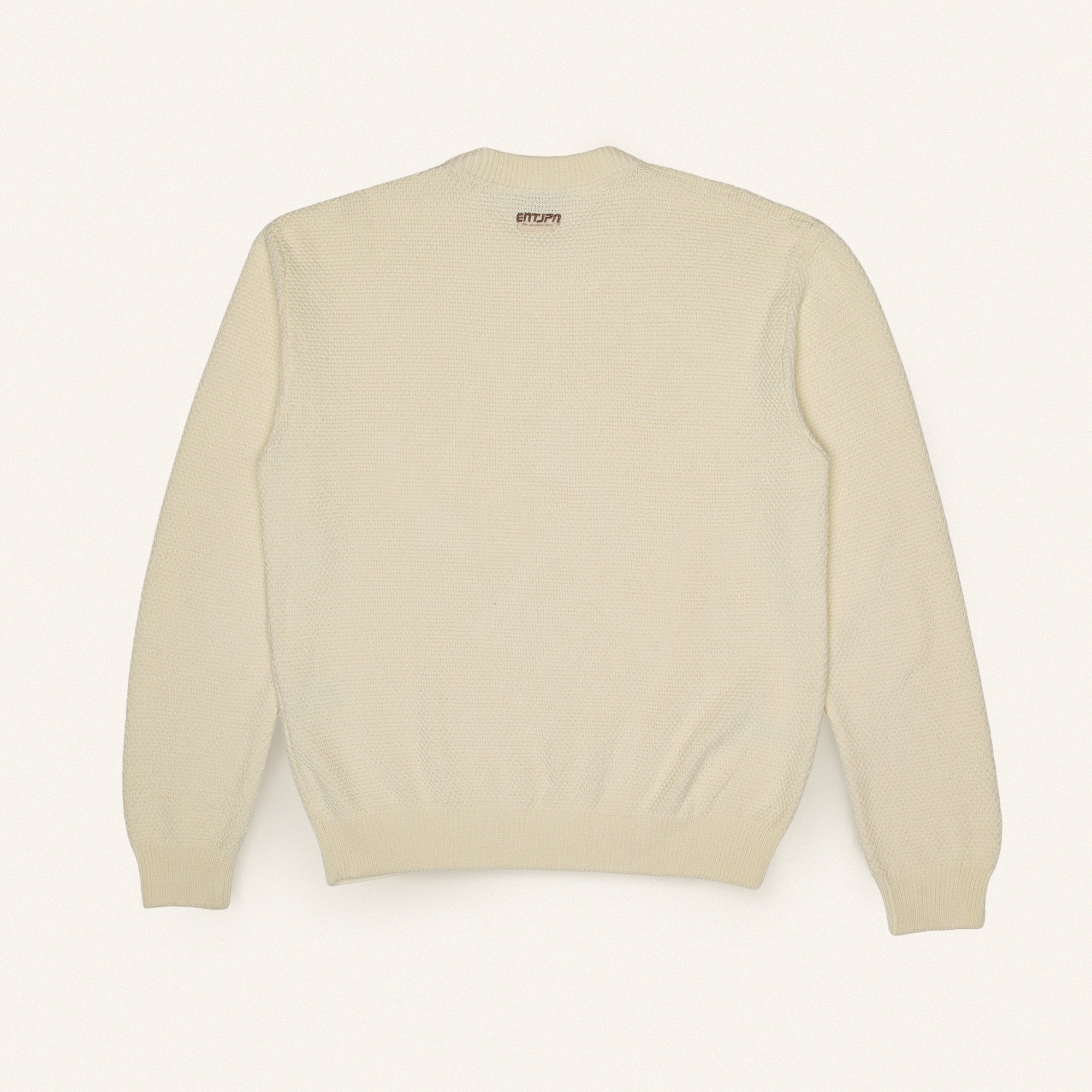 Maglione in cotone color burro con logo ENTJPN
