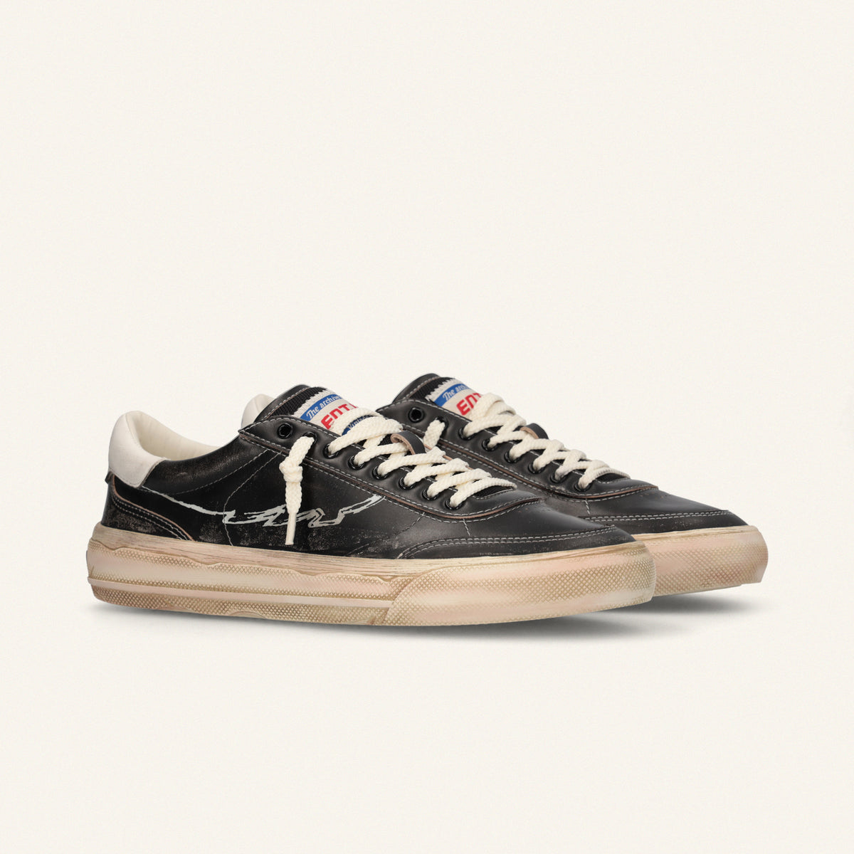  ENTJPN 75 – Black leather sneakers