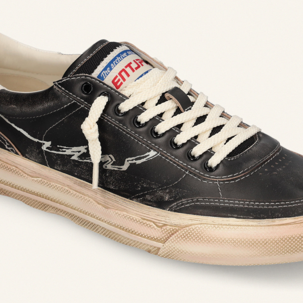  ENTJPN 75 – Black leather sneakers