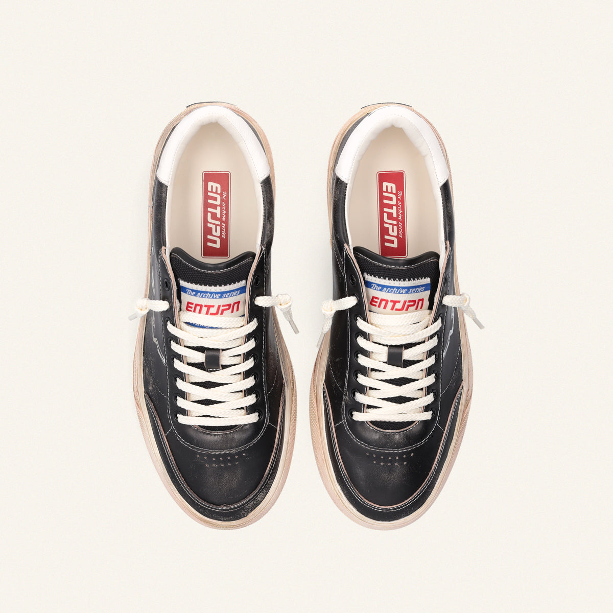  ENTJPN 75 – Black leather sneakers