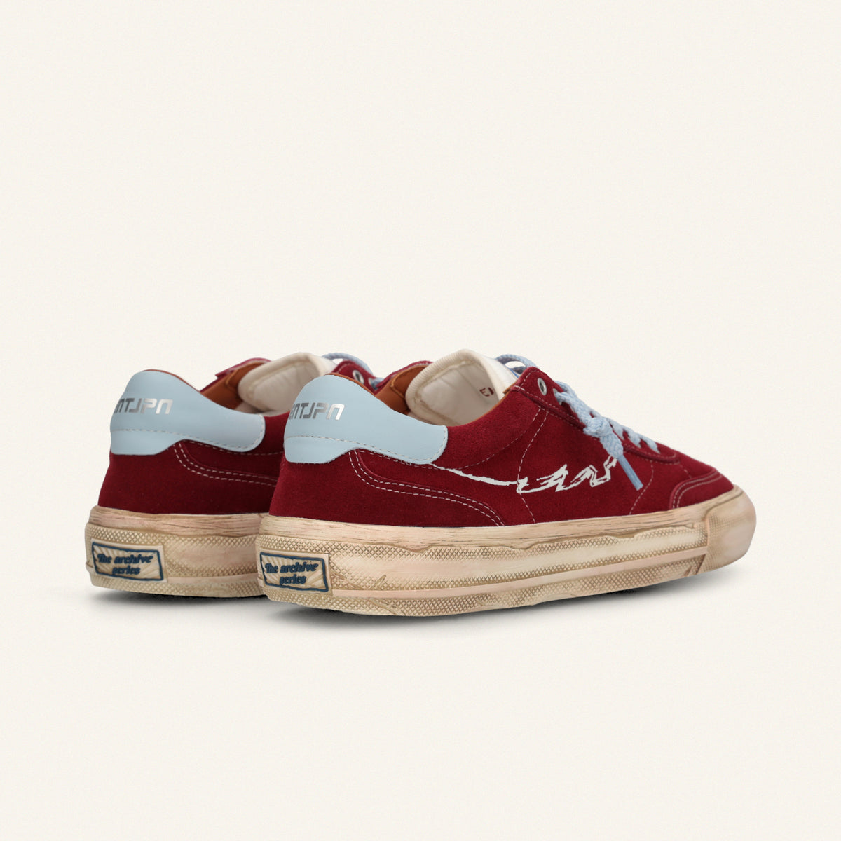 ENTJPN 75 – Sneaker in suede bordeaux con dettagli sky