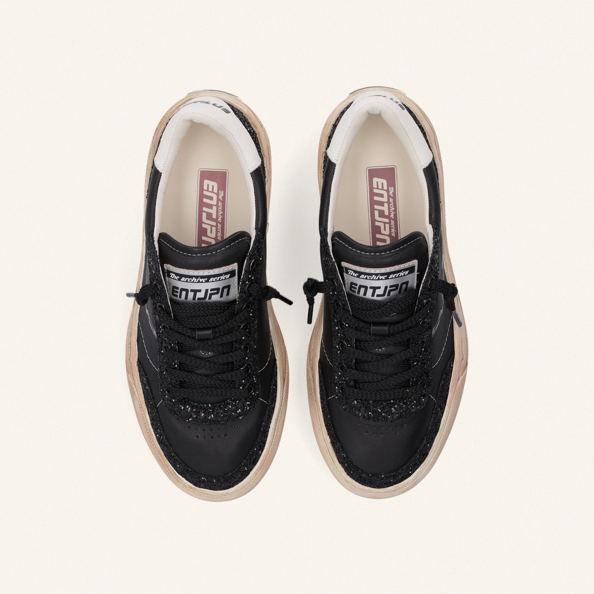 ENTJPN 75 – Sneaker in pelle nera con inserti glitter