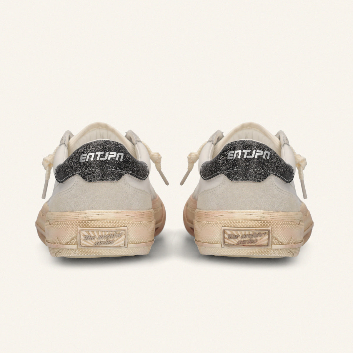 ENTJPN 75 – white leather sneakers with taupe suede details