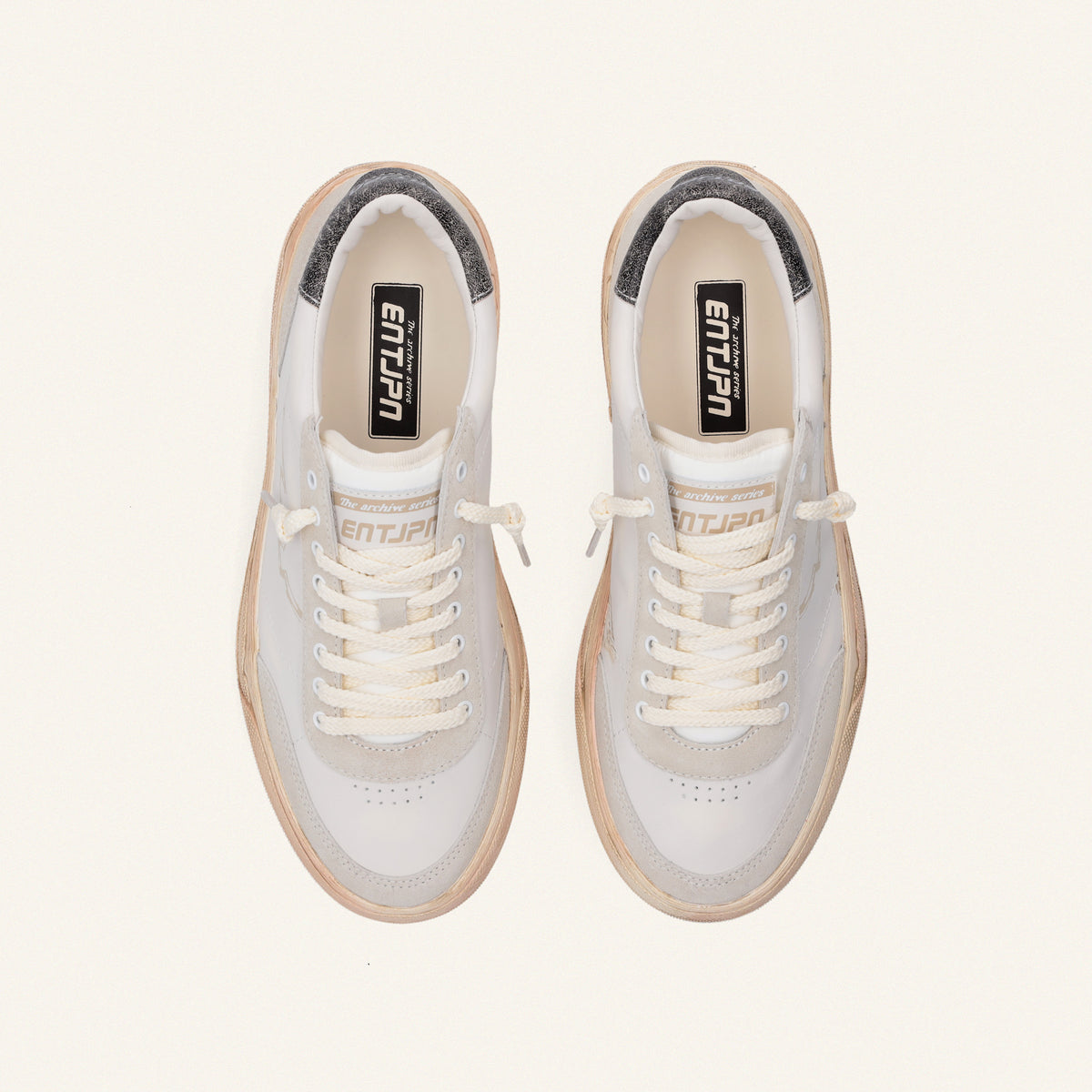 ENTJPN 75 – white leather sneakers with taupe suede details