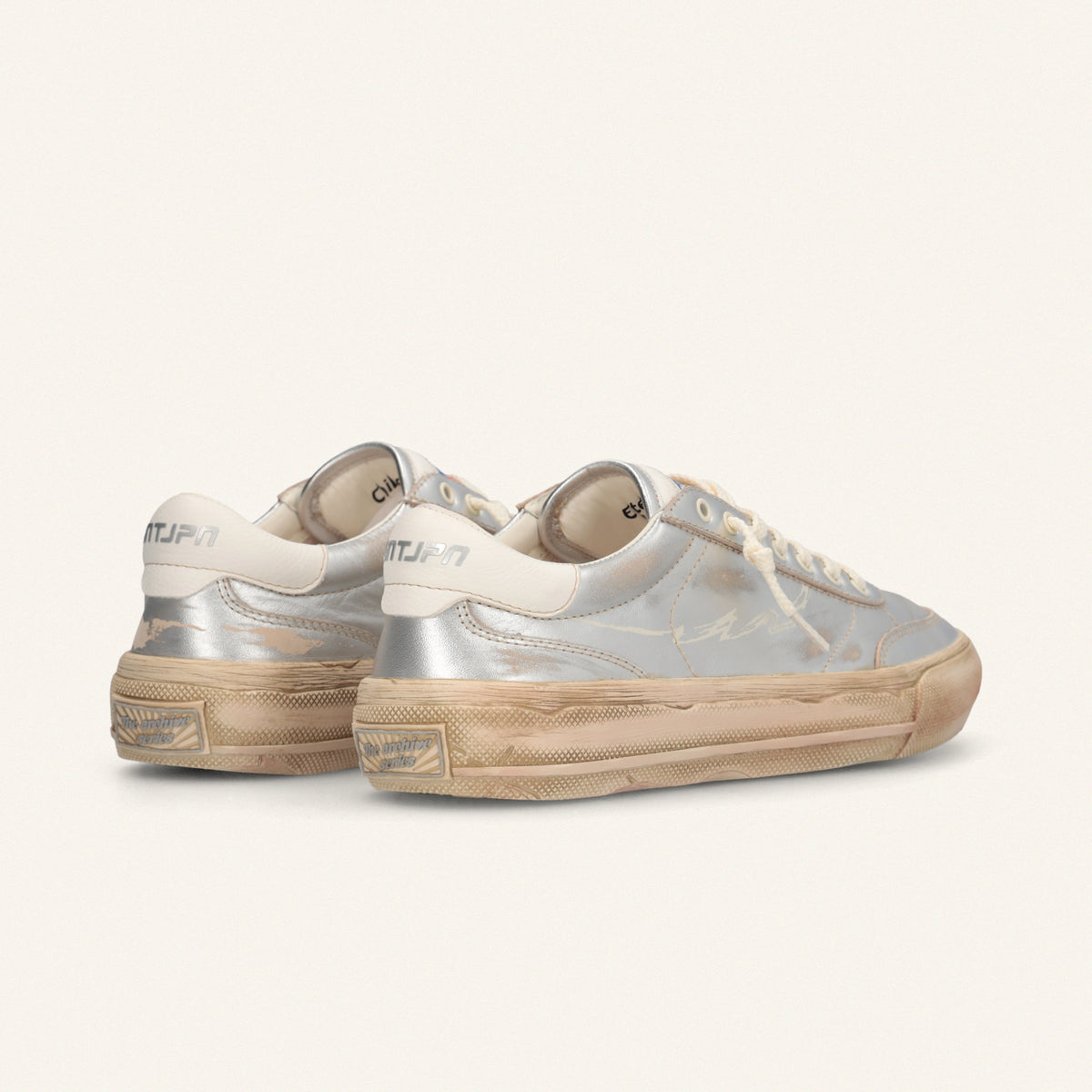 ENTJPN 75 – Sneaker in pelle laminata silver