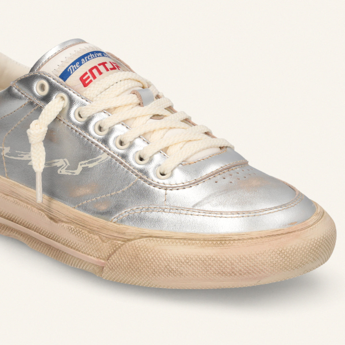 ENTJPN 75 – Sneaker in pelle laminata silver