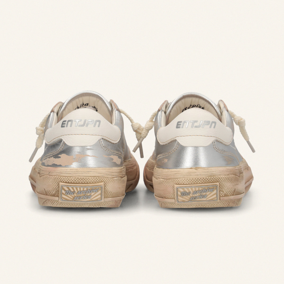 ENTJPN 75 – Sneaker in pelle laminata silver