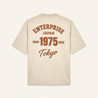 T-shirt in cotone color burro con stampa 'ENTJPN 1975 Tokyo'
