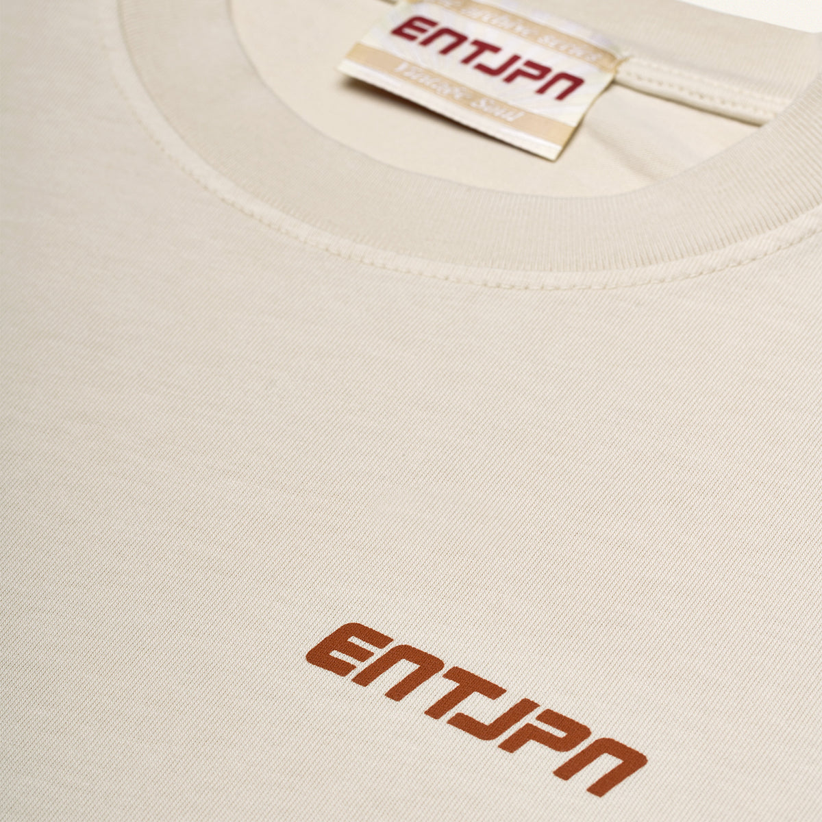 T-shirt in cotone color burro con stampa 'ENTJPN 1975 Tokyo'